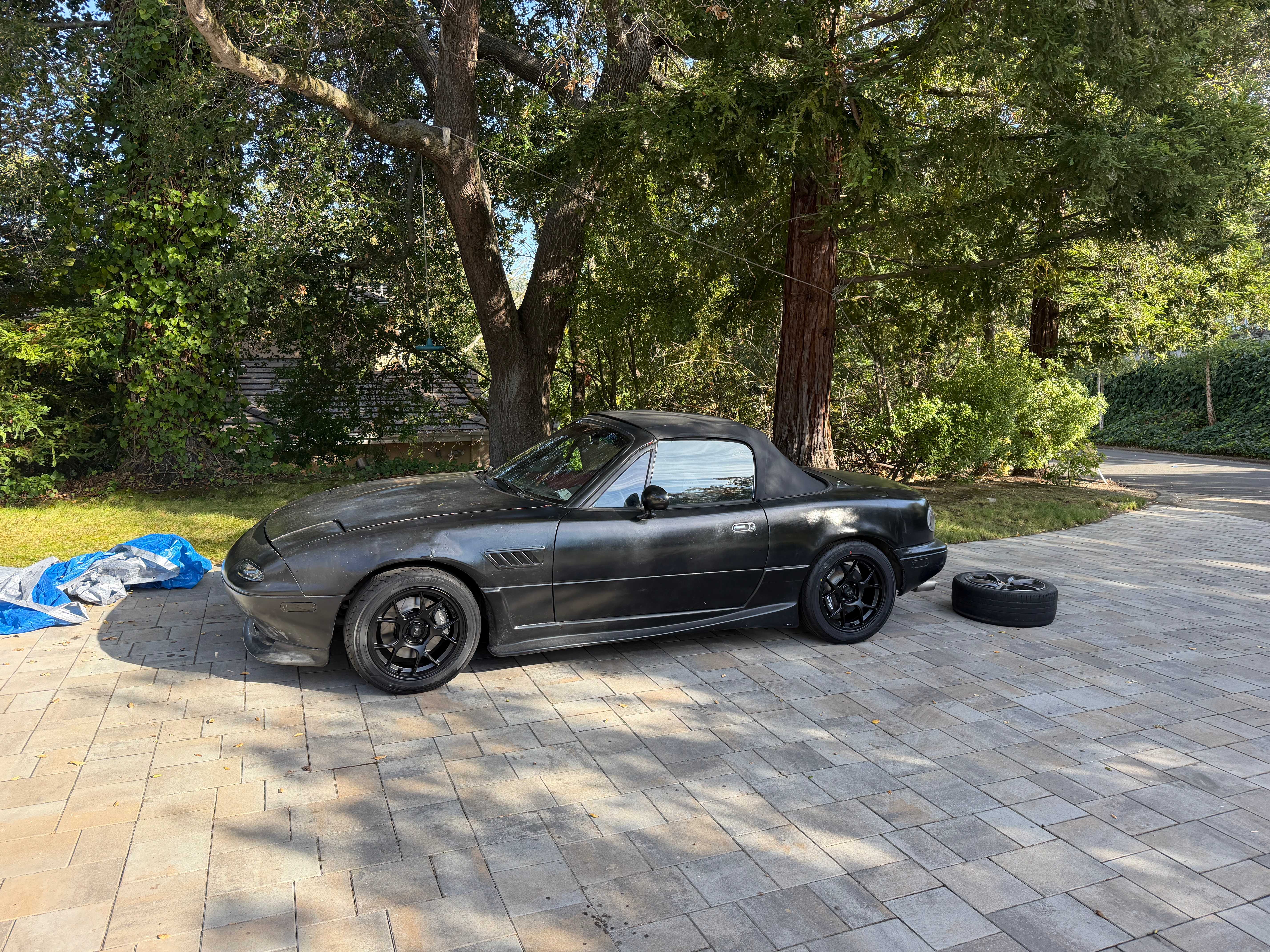 Black Mazda Miata project car